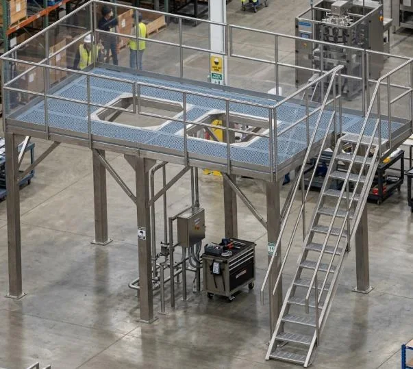 Double mezzanine with two weigher mounting openings and access stairs